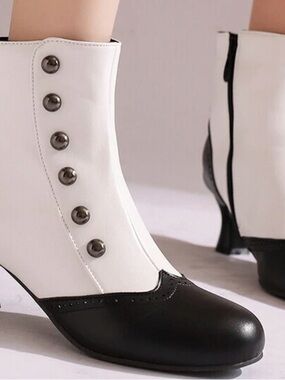 Black and white vintage inspired Victorian boots with retro button details